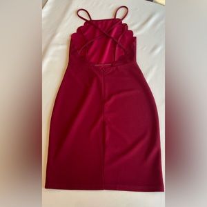 Red scalloped halter dress.